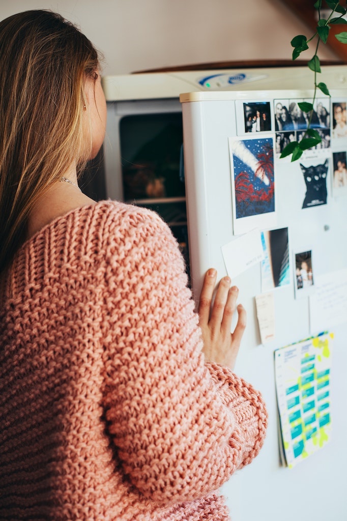 woman looking in pantry