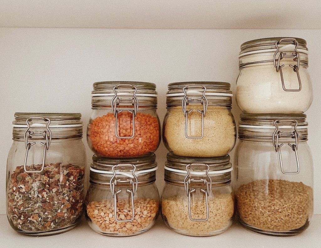 clear glass containers with dry pantry ingredients